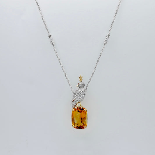 Platinum bird pendant pavé set with moissanites, perched on an 18 carat honey gold lab grown citrine