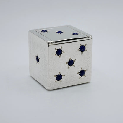 Silver dice trinket box with sliding lid open, showing the gilt interior