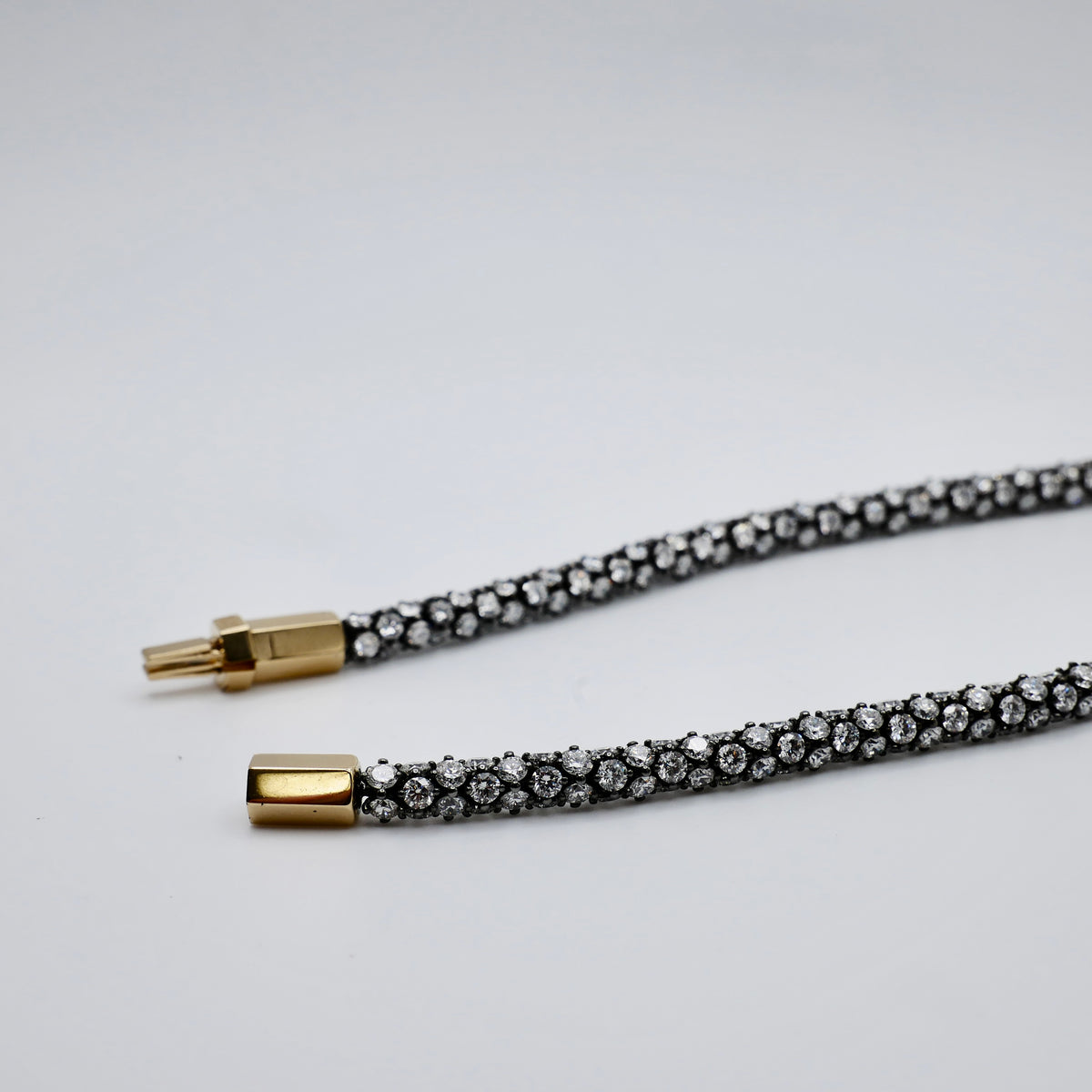 Pavé rope tennis necklace with 18K yellow gold double-tongue box clasp