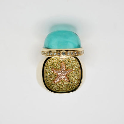 Aquamarine Cabochon Ring with Hidden Opening Starfish