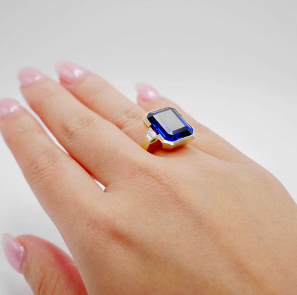 Lab Grown Emerald Cut Sapphire with Trapezoid Diamonds Gold Bezel Three Stone Ring, 18K Gold, view 9