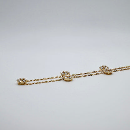 Five lab grown diamond flowers, 3.7 ct total, on a 16.5 inch 18K gold necklace
