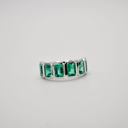 Half Eternity Lab Grown Emerald Cut Emerald Ring in Platinum Bezel Setting, view 2