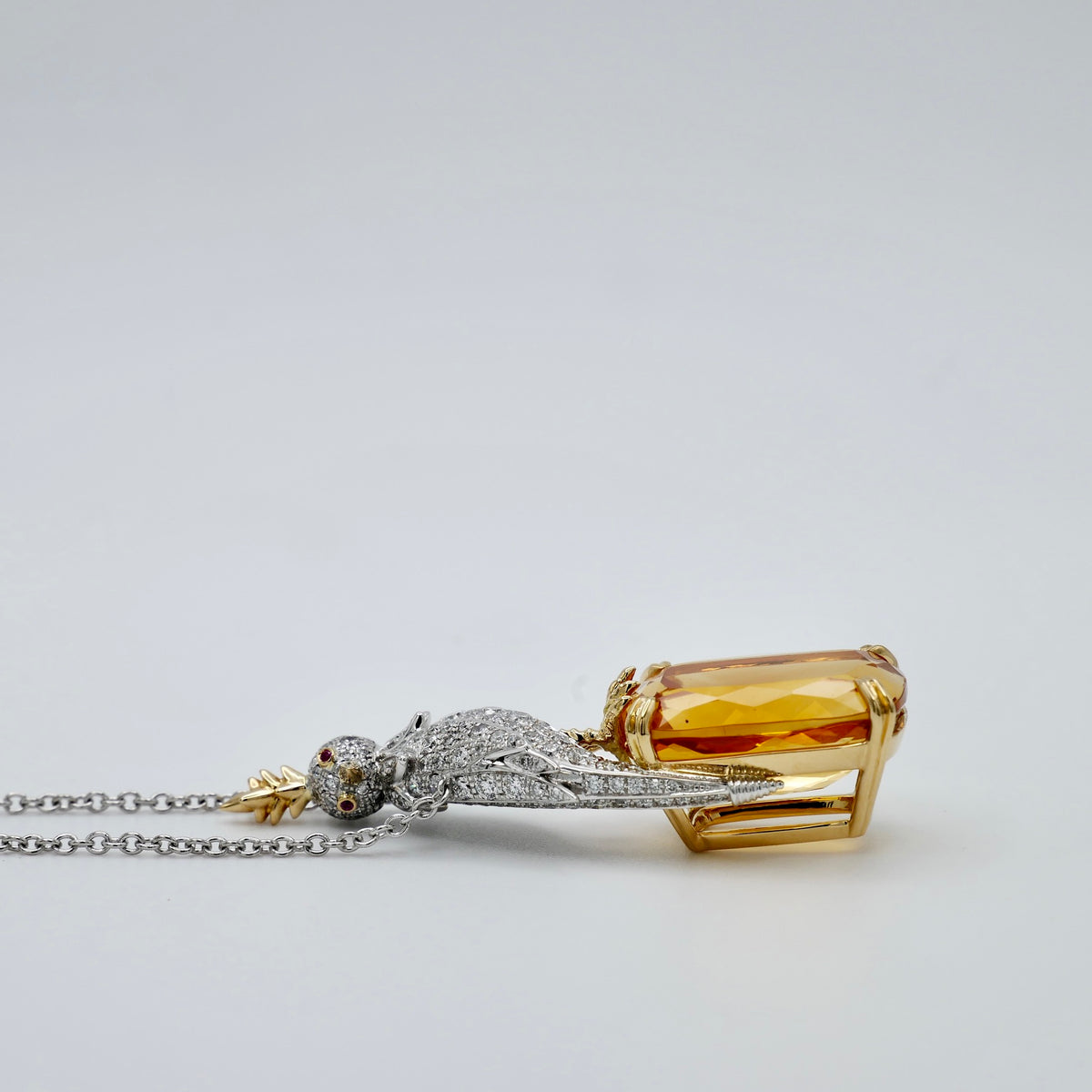 Citrine bird necklace in platinum and 18K yellow gold on a 59.5 cm white gold chain