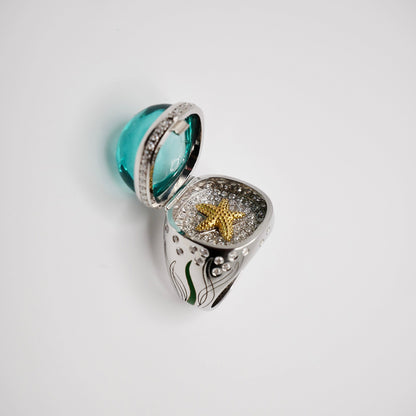 Aquamarine Cabochon Ring with Hidden Opening Starfish