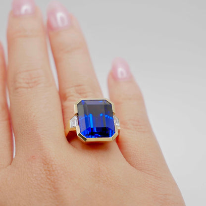 Lab Grown Emerald Cut Sapphire with Trapezoid Diamonds Gold Bezel Three Stone Ring, 18K Gold, view 8