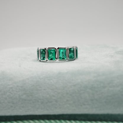 Half Eternity Lab Grown Emerald Cut Emerald Ring in Platinum Bezel Setting, view 4