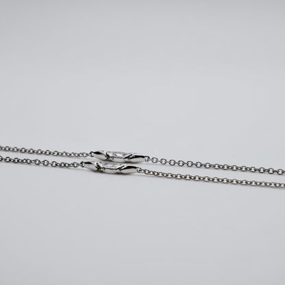Crested bird pendant necklace in platinum and 18K yellow gold, pavé set with moissanites