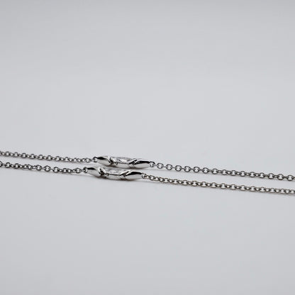 Crested bird pendant necklace in platinum and 18K yellow gold, pavé set with moissanites
