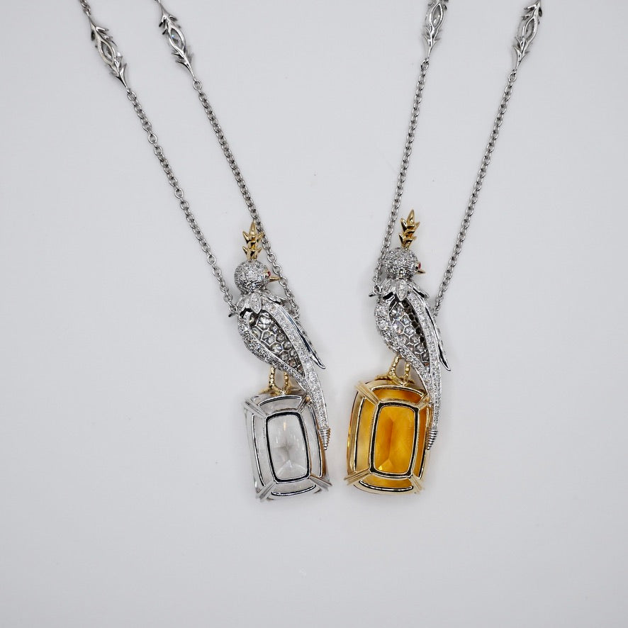 Bird necklace in platinum and 18K gold with a pavé moissanite bird and a gold crest