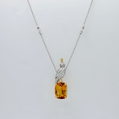 Platinum bird pendant pavé set with moissanites, perched on an 18 carat honey gold lab grown citrine