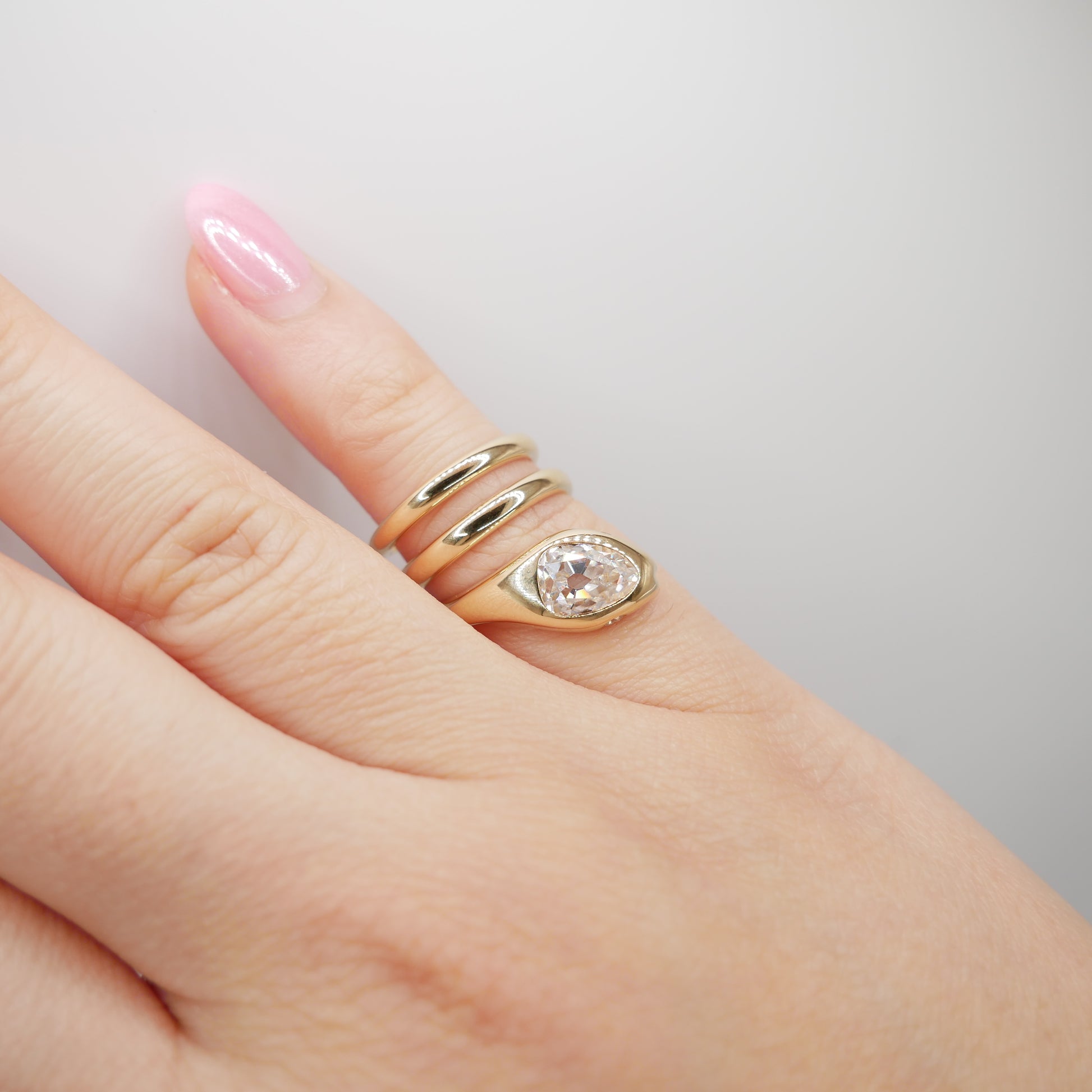 18K Yellow Gold Serpent Coil Ring with Old Mine Cut Pear Shaped Moissanite | by Disco Marshmallow | Arielle Ratner style | Tania Sarin jewelry | serpent ring | sculptural jewelry
