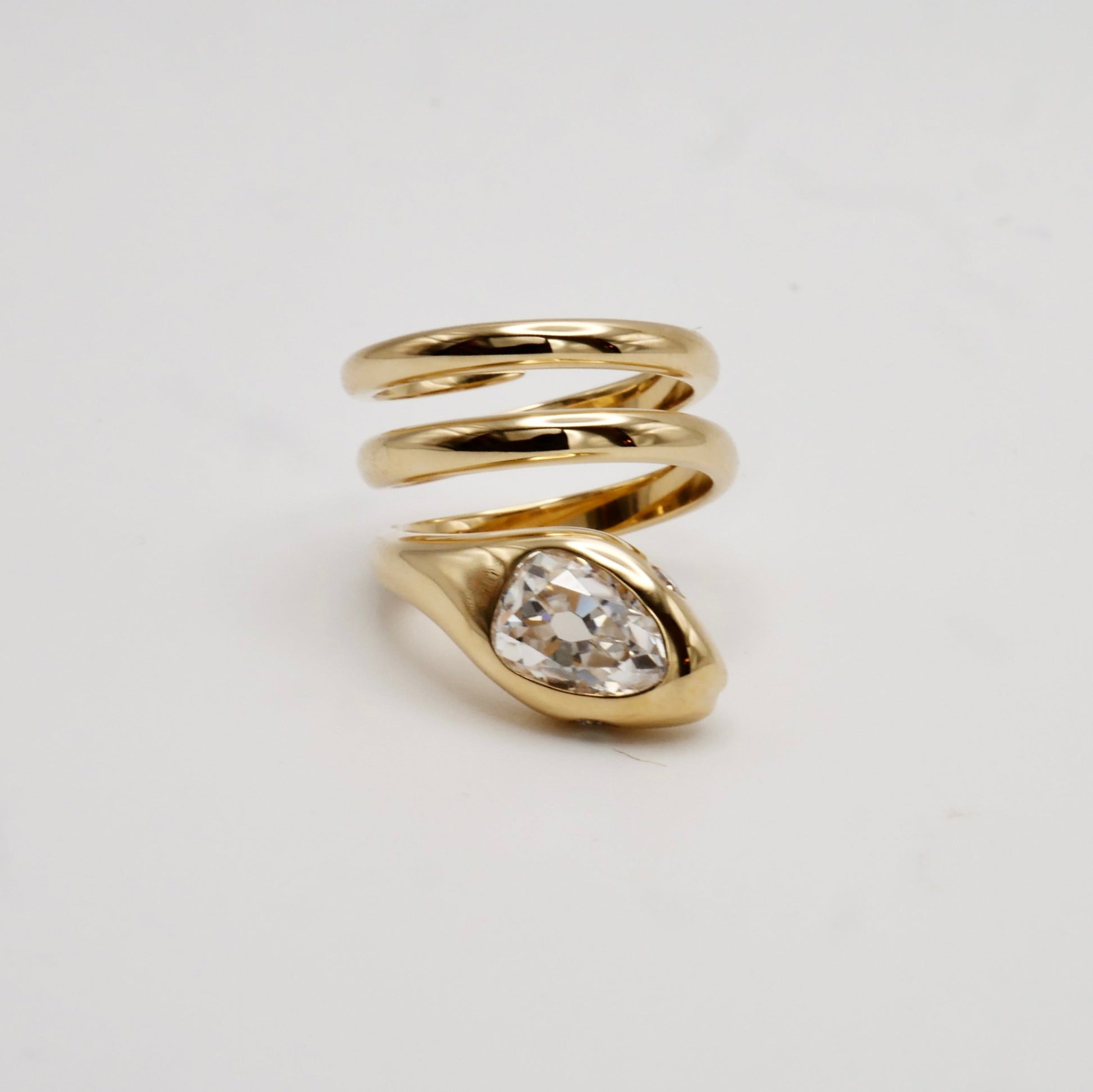 18K Yellow Gold Serpent Coil Ring with Old Mine Cut Pear Shaped Moissanite | by Disco Marshmallow | Arielle Ratner style | Tania Sarin jewelry | serpent ring | sculptural jewelry