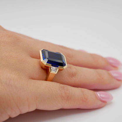 Lab Grown Emerald Cut Sapphire with Trapezoid Diamonds Gold Bezel Three Stone Ring, 18K Gold, view 10