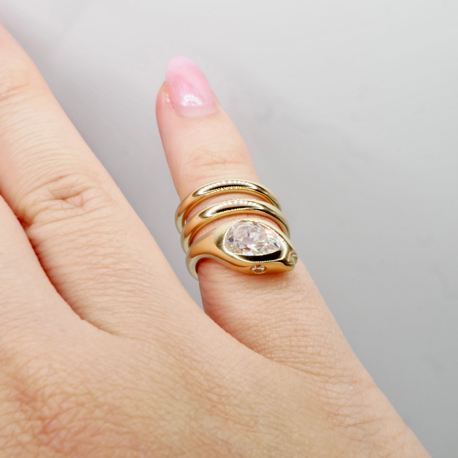 18K Yellow Gold Serpent Coil Ring with Old Mine Cut Pear Shaped Moissanite | by Disco Marshmallow | Arielle Ratner style | Tania Sarin jewelry | serpent ring | sculptural jewelry