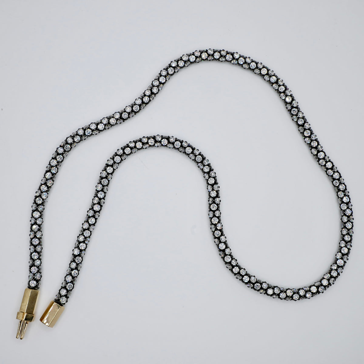 35 carat pavé tennis rope necklace in oxidised sterling silver with 18K yellow gold clasp