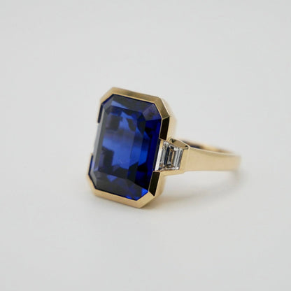 Lab Grown Emerald Cut Sapphire with Trapezoid Diamonds Gold Bezel Three Stone Ring, 18K Gold