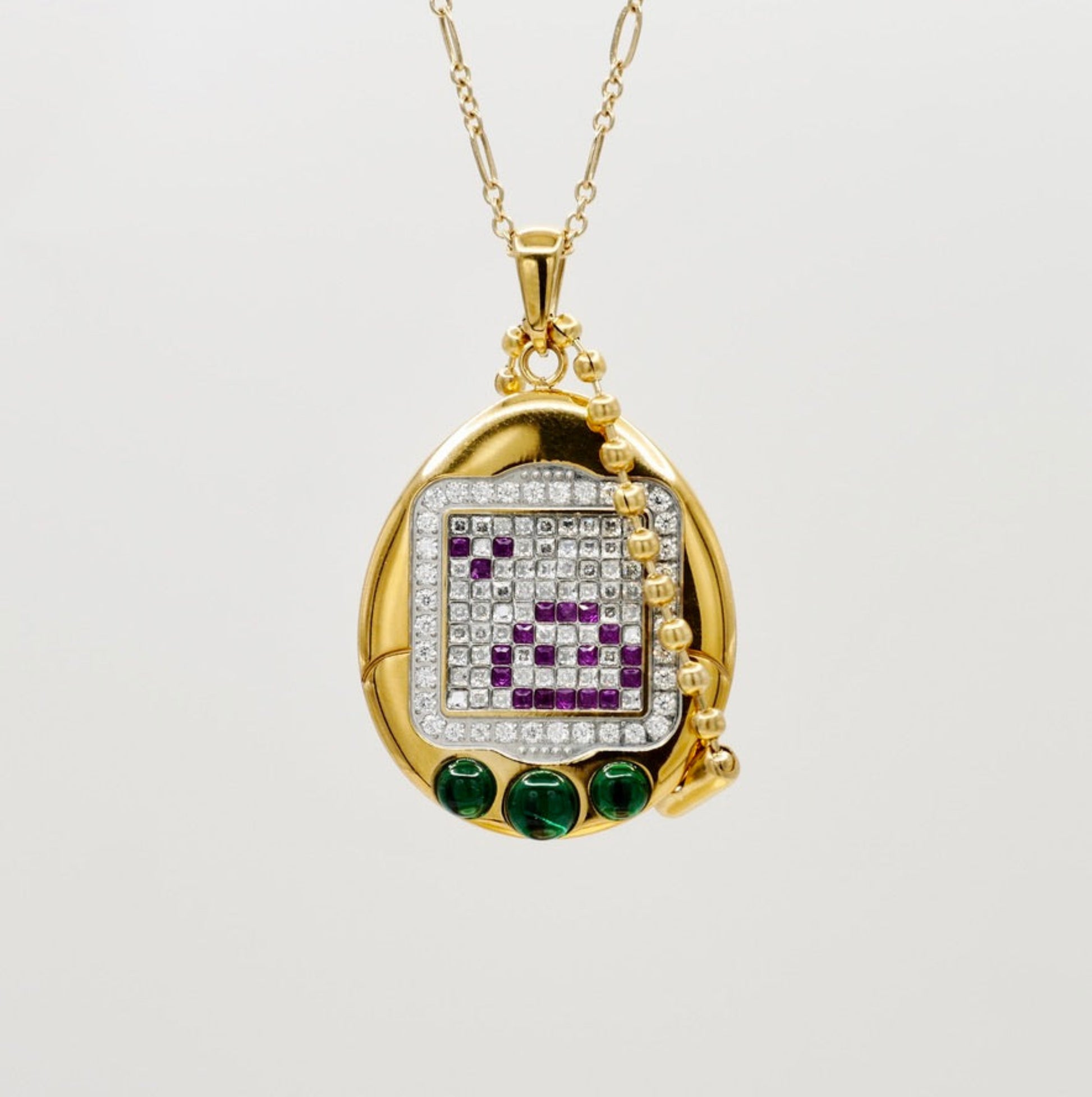 Tamagotchi pendant with emeralds, sapphires, rubies and diamonds