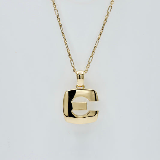Chunky block initial pendant in solid yellow gold, 38 mm, with a domed high-polish finish and heavy bale