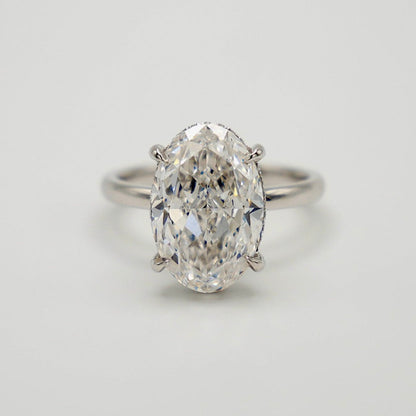 Oval Cut Lab Diamond Tiger Prong Basket Ring in Platinum