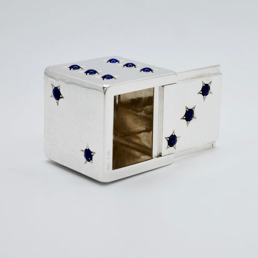 Sterling silver dice pill box with lapis lazuli cabochon pips, each set in a six-pointed star
