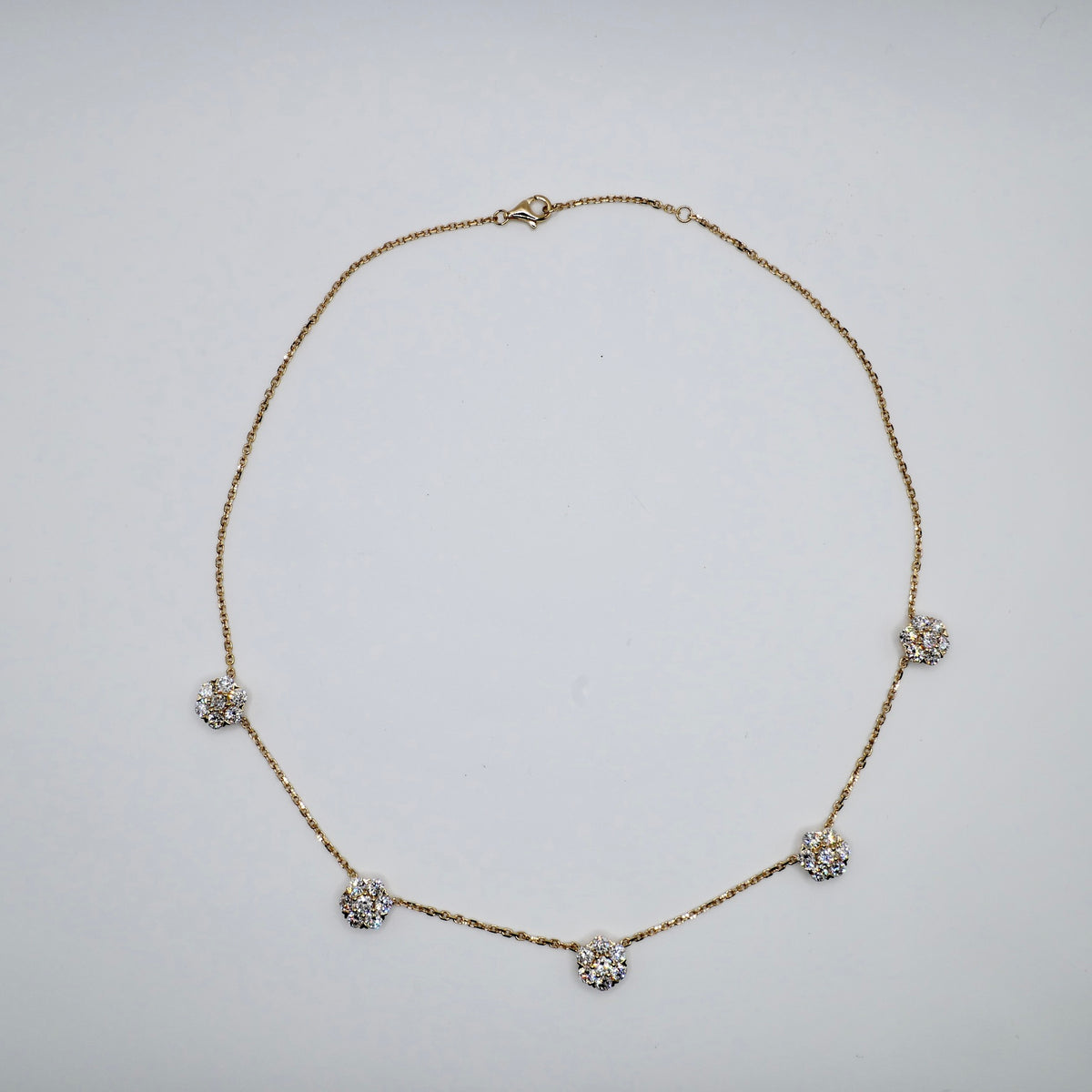 18K gold station necklace with five lab grown diamond flower clusters, 16.5 inches long