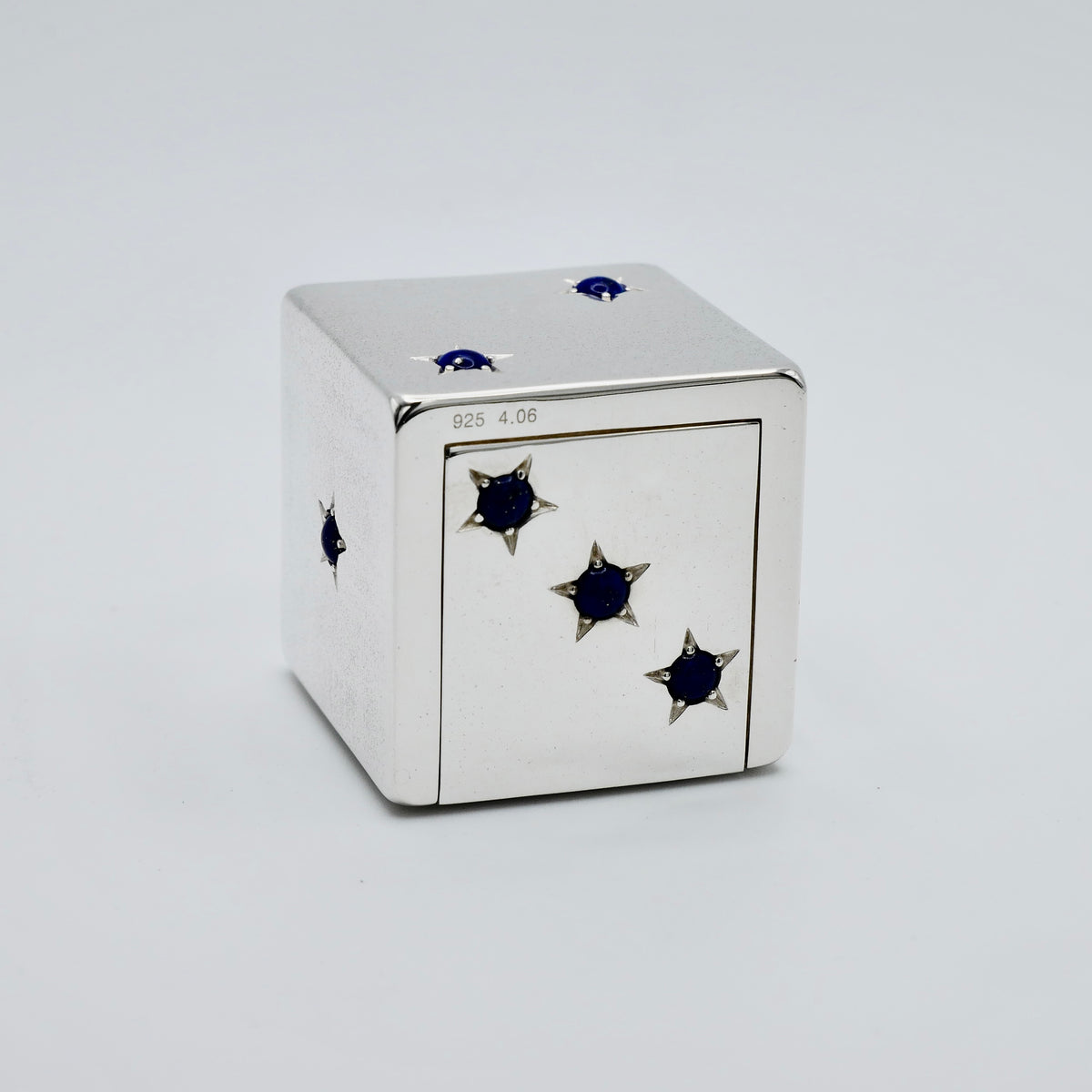 Dice pill box in 925 sterling silver with blue lapis lazuli cabochons in star settings