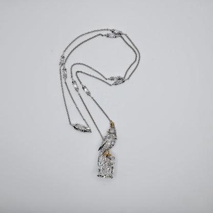 18K solid gold and platinum bird necklace with an 18 carat radiant cut lab diamond