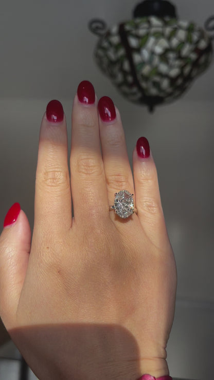 Oval Cut Lab Diamond Tiger Prong Basket Ring in Platinum